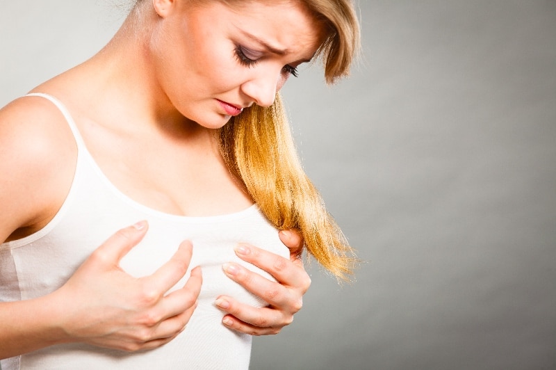 woman with breast pain