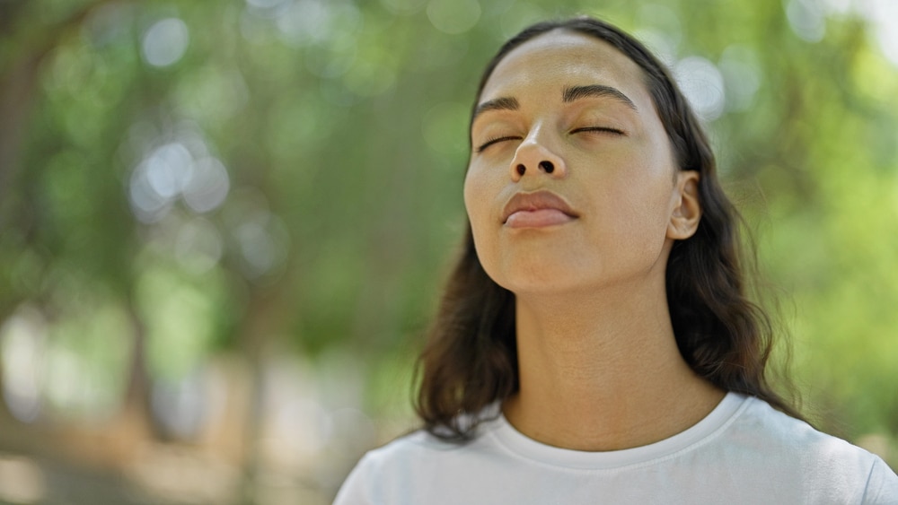woman with eyes closed