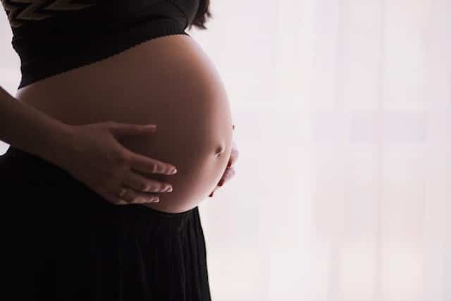 woman with pregnant belly